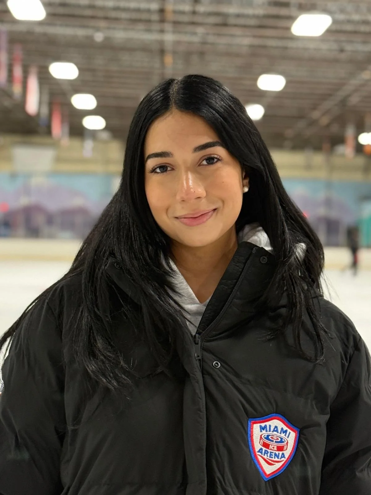 Miami Ice Arena figure skating staff member on the rink